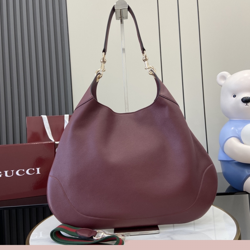 G*u*i top handle bags